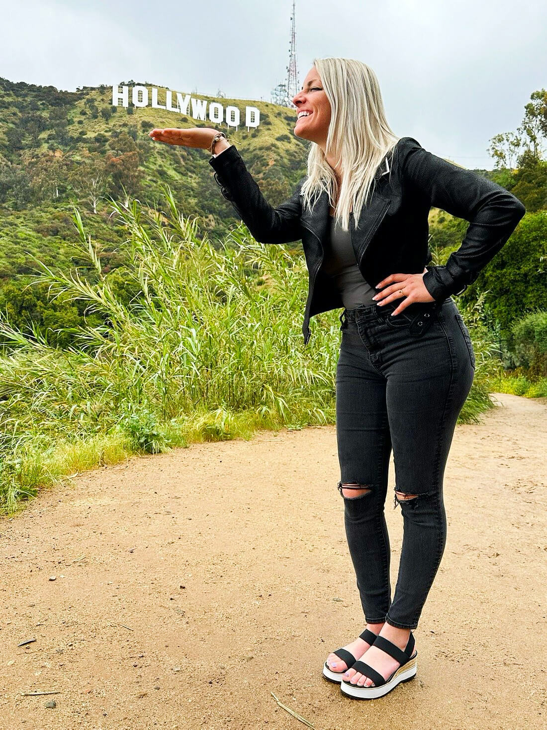 Woman with Hollywood Sign VIP Hollywood Tour Los Angeles